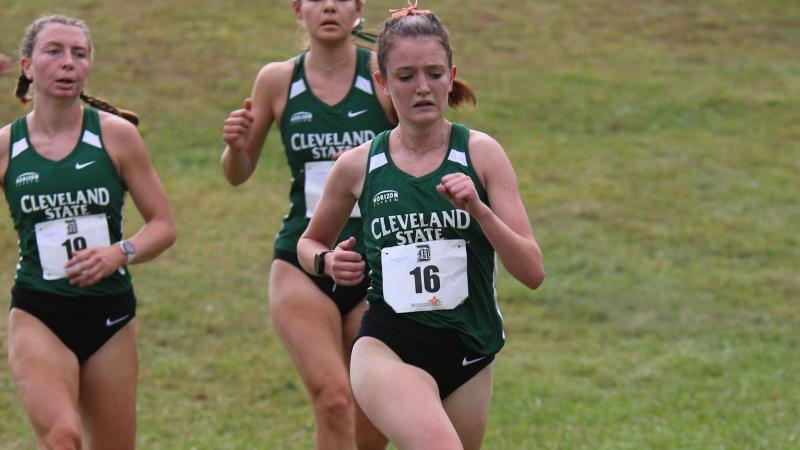 Emily Nemeth (center) joined junior teammate Hannah Korte, Nemeth posting a time of 25:59 and Korte recording a time of 26:02.