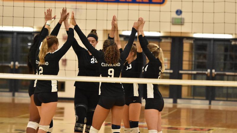 Caption: Cleveland State women’s volleyball huddle up during the Baltimore Invitational Aug. 27