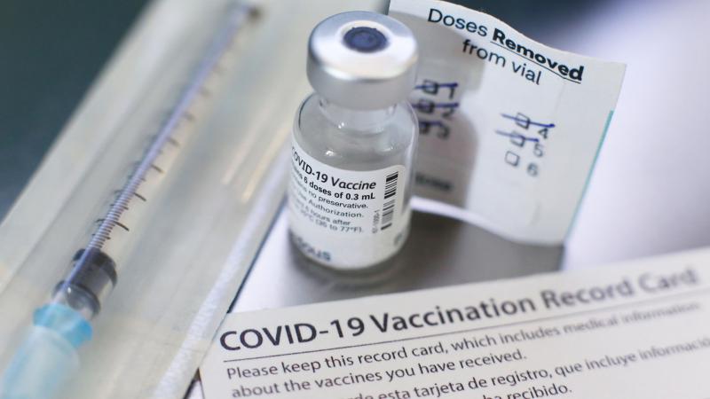 COVID-19 vaccine, vaccination card, needle