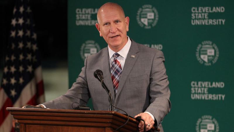 Sands speaks to the media during the opening of a vaccine clinic on campus