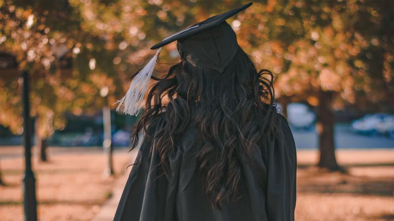 student in cap and gown