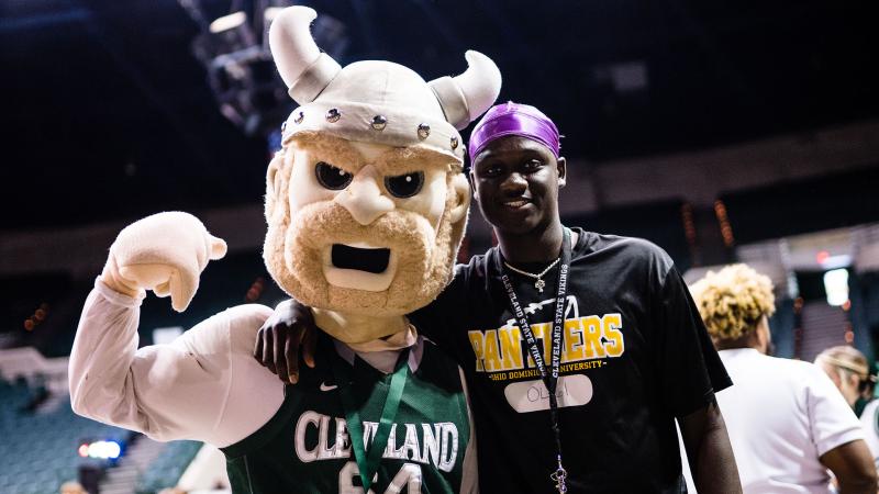 CSU mascot Magnus, left, poses with a student at MagnusFest 2022