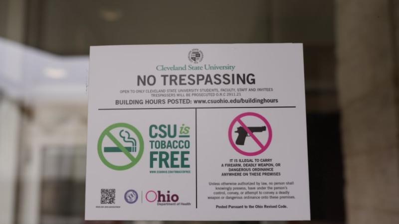 No guns sign outside Communications building