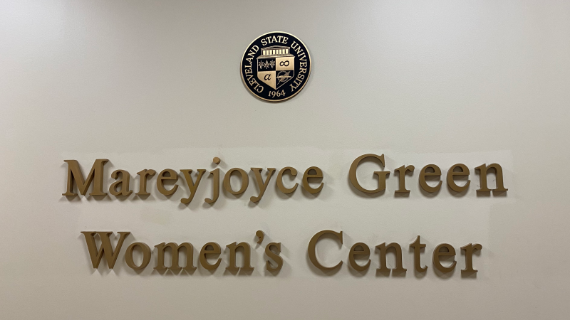 The Mareyjoyce Green Women's Center banner on the wall of Berkman Hall.