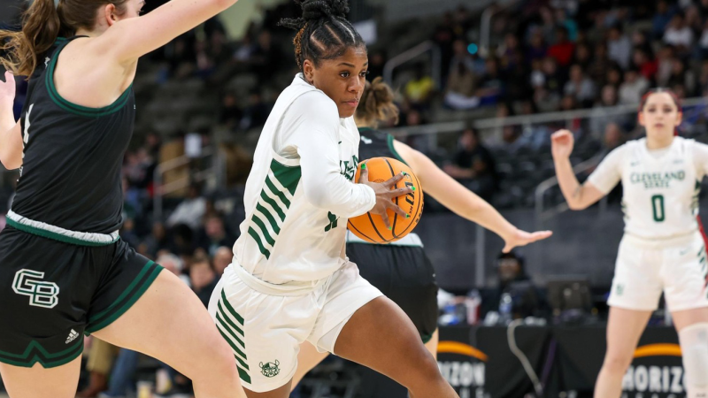  Colbi Maples (11) avoids getting the ball stolen by Green Bay, on March. 12, 2024,  Indiana Farmers Coliseum.