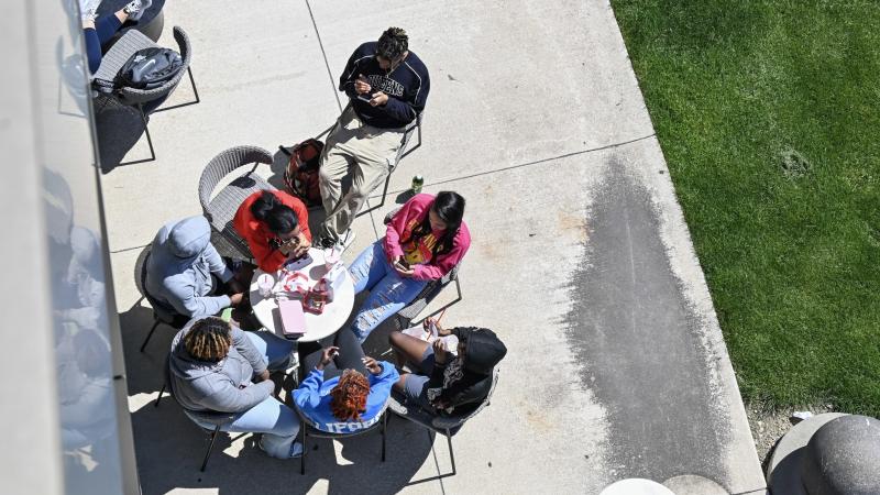 Student sitting on campus