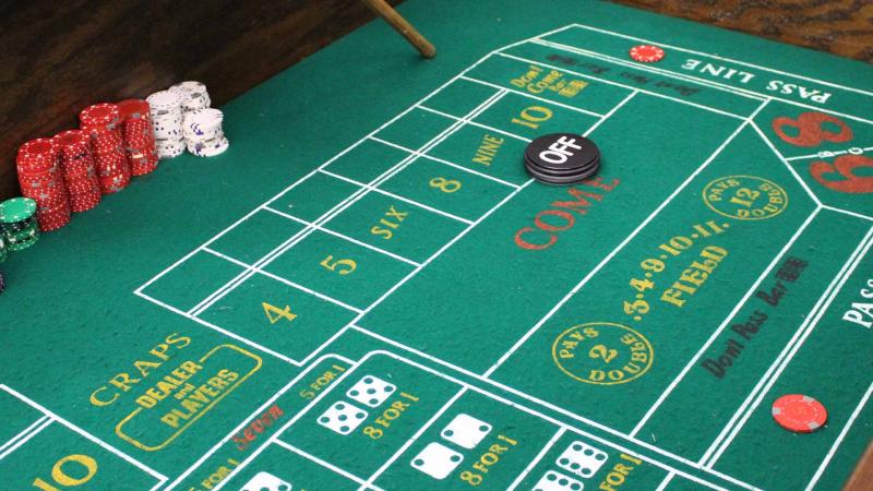 Students gather around to play CRAPS at Cabsino