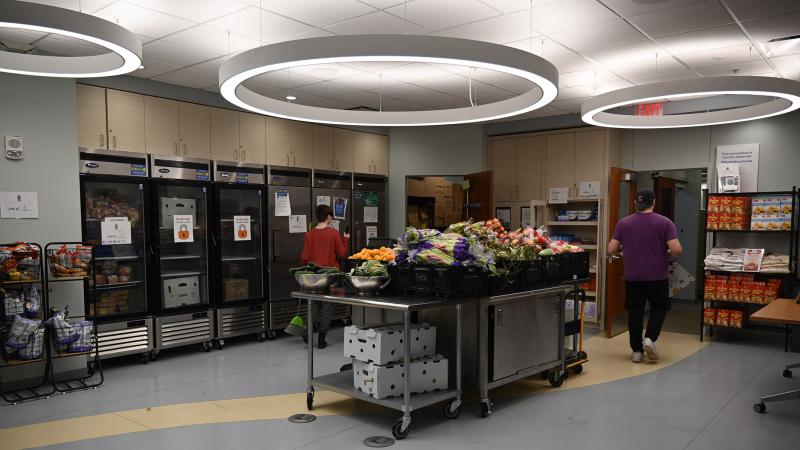 Pantry assistants stock and clean the pantry before students arrive for the annual CSU Lift Up Vikes! food drive.