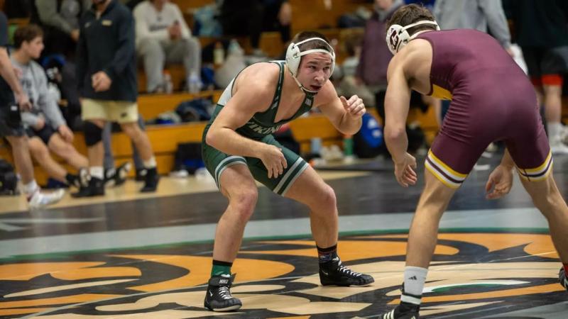 CSU Wrestling redshirt freshman Ethan Mitchell, left, pinned George Mason’s Dominic Hargrove in 1:32 at the 141-pound weight class on Jan. 18, 2025 in the Woodling Gymnasium. 