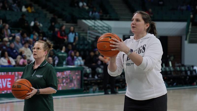 Levin College of Public Affairs and Education Dean Jill Gordon, Ph.D., left, and a CSU student prepare to shoot free throws Feb. 12, 2025.