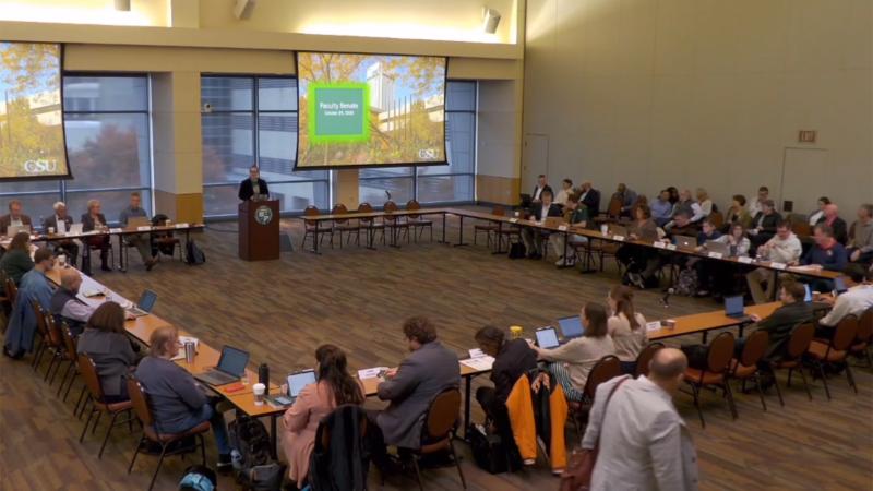 Faculty members arrive to begin the meeting on Oct. 29, 2026. 