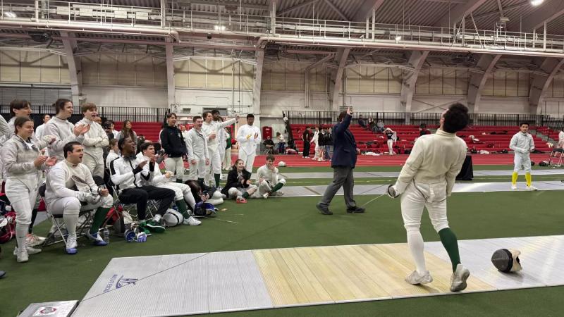 The Cleveland State fencing teams cheer on their teammate at the OSU Elite Invitational on Nov. 9, 2025 at Ohio State's French Field House in Columbus.