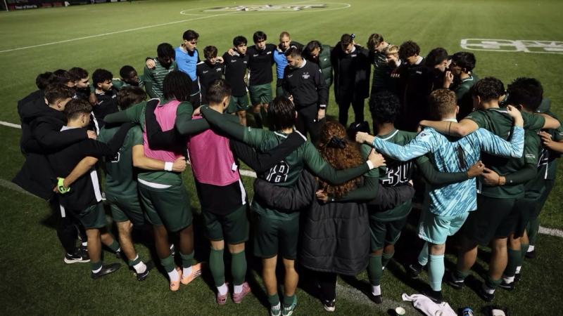 The Vikings huddle after their postseason run came to an end, Nov. 20, 2025 at Hoops Family Field in Huntington, West Virginia.