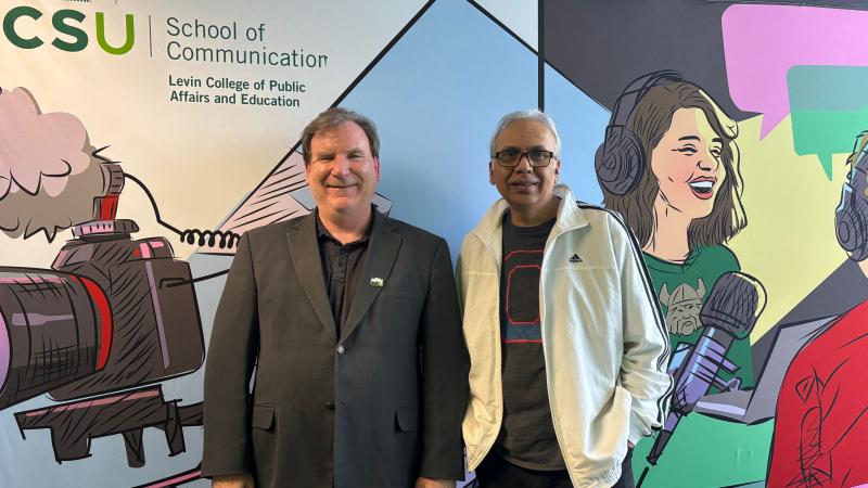 Robert Whitbred, Ph.D. (left) and Anup Kumar, Ph.D. (right) at the Cleveland State University School of Communication, April 16, 2026.