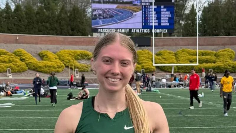 Olivia Todd, Cleveland State track star, proudly posing after setting a school record in Lewisburg, PA. (Credit: Cleveland State Athletics)