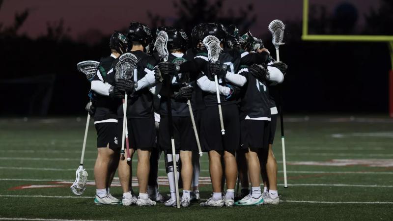 CSU Lacrosse in a huddle
