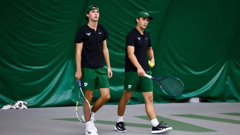 Nico Jamison and Tristan Stine walking onto the tennis court, Sept. 27, 2026.