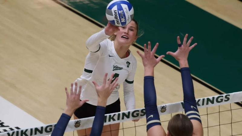 Alyssa Cerovac jumps for the ball.