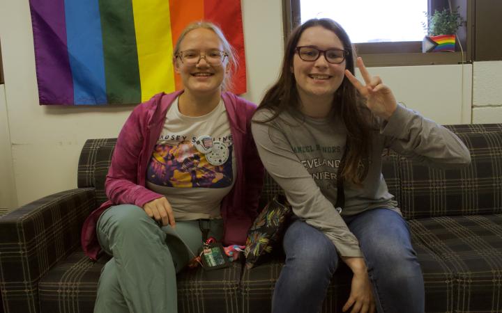 Yana (left, she/her), a psychology major, and Audrey Stratton (right, she/her), a chemistry major, pose for a picture at the Pride Mixer