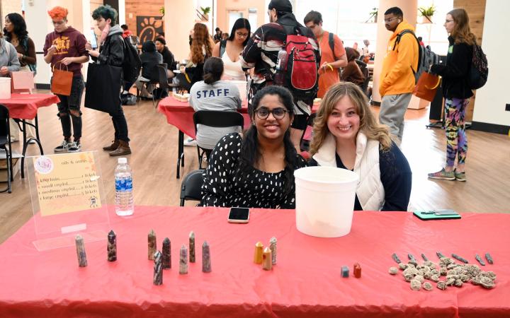  Hari Priyanka, left, and Taylor Lucas show off the many keychains and crystals on offer. (credit: Alex Martinez)