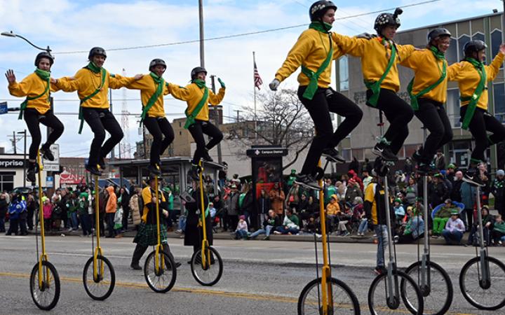 People riding unicycles during the St. Patrick’s Day parade, March 17, 2024. (credit: Alex Martinez)