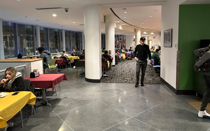 Students walked to different stations to grab drinks and find places to sit.