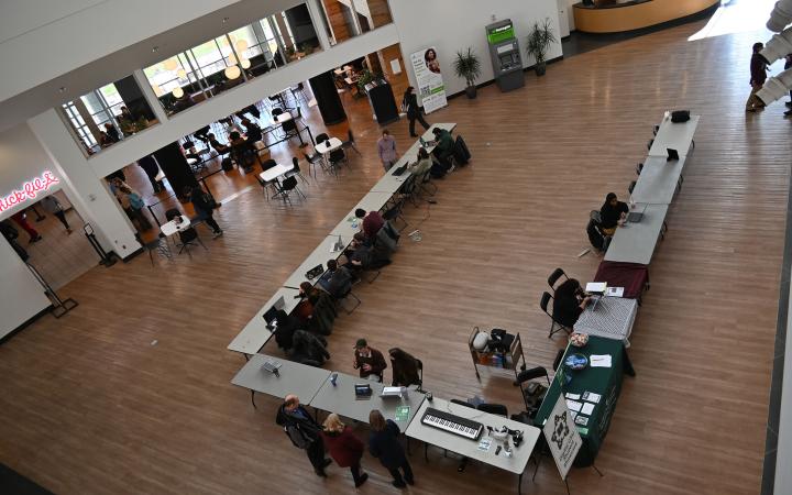 Wide shot of the Digital CSU Student Showcase in the Student Atrium, Dec. 3, 2024