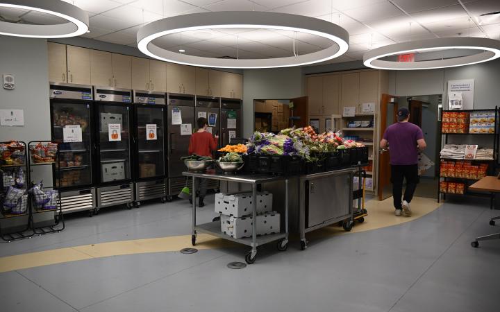 Pantry assistants stock and clean the pantry before students arrive for the annual CSU Lift Up Vikes! food drive. 