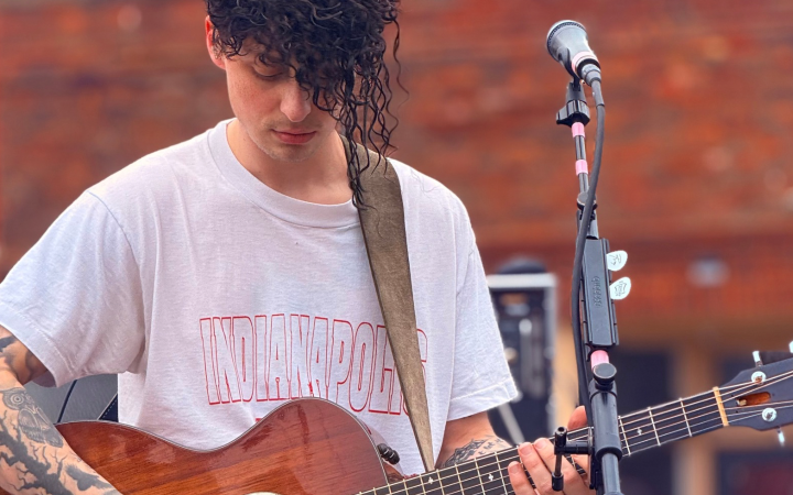 Alex Razayeski plays guitar