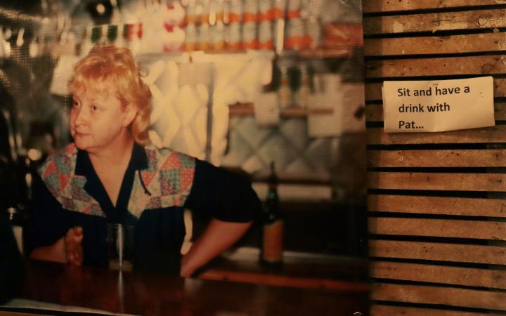 The section where guests could have a drink with Patricia Hanych, featuring a picture of her behind the bar in the 80s.