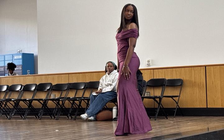 General Business major Deja Greenwood fitted in a purple dress, Nov. 6, 2025. (credit: Anthony Reed)