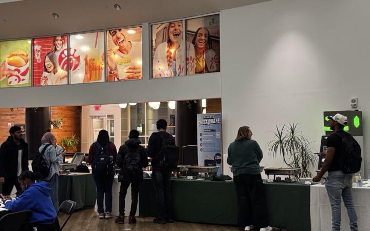 Students lining up for a variety of cultural refreshments in the Student Center Atrium, Nov. 4, 2025. (credit: Anthony Reed)