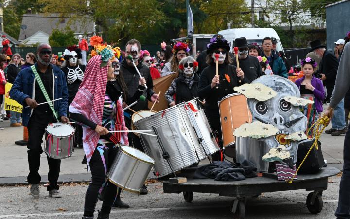 A parade float with several drummers hype up the crowd as the parade started, Nov. 1, 2025. (credit: Alex Martinez)