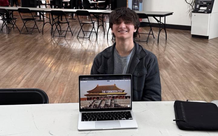 Joseph Castro showing off the website they created showcasing “The Forbidden City”, an imperial era palace in Beijing, China. (credit: Anthony Reed)