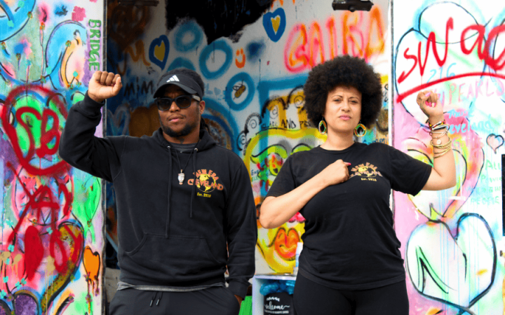 New Era Cleveland leaders, chairman Fahiem and President Austreeia Everson in front of the New Era Clubhouse doors on June 9, 2025. (credit: Ruby Darwish )