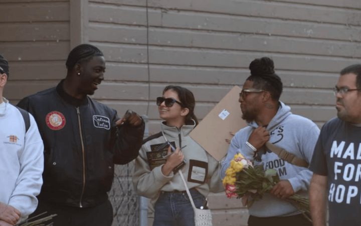 New Era Scholars President Rameer Askew, second from left, NEC member Sabrina Wicker,middle, chairman Fahiem, second from right, and other members at a community engagement walk on Oct. 26, 2025. (credit: Milo Pond)