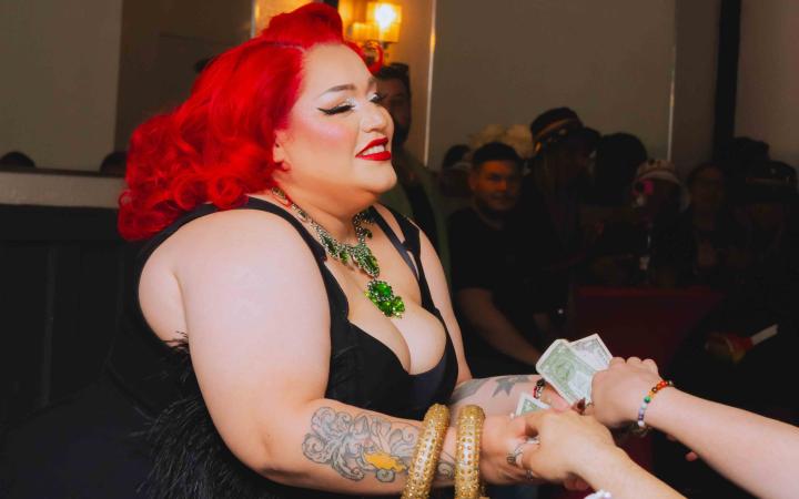 Bella Sin reaching for hands, embracing fans on June 2, 2025. 