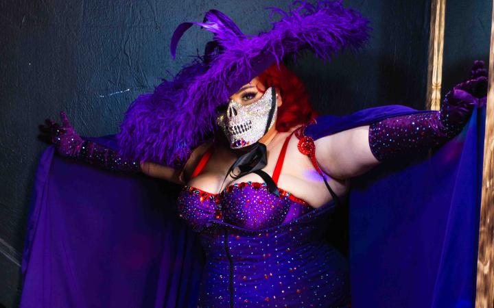 Bella Sin posing in a self-designed and made garment inspired by her culture on June 2, 2025. 