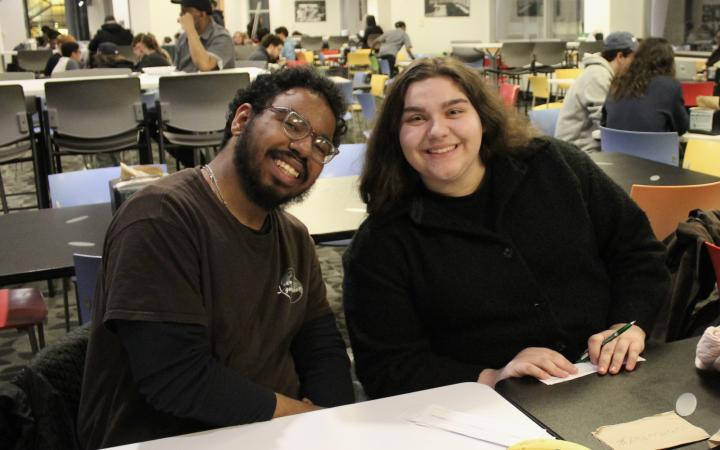 Students Yadiel Mercado, left, and Christina Arrichi pose while playing a round of “pop culture moments” trivia in Viking Marketplace on Thursday, Jan. 29, 2026.