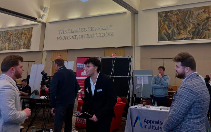 Taken by Morgan Alten, students in the Glasscock Ballroom connecting with employers