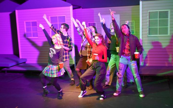 Dancers performing in The Jagged Little Pill