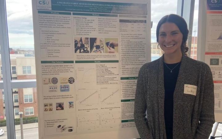 Madison Luthy presents her sweat sensor research at the Cleveland State University Bell Lecture on April 8, 2026. 