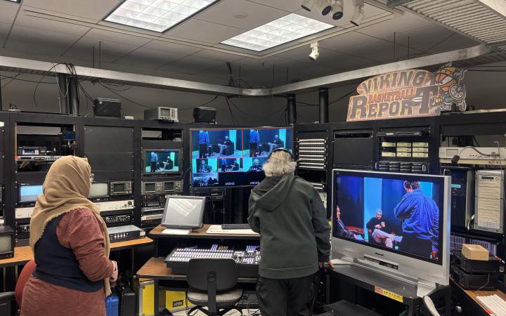 Professor Ban working with students in the control room on the day of the event