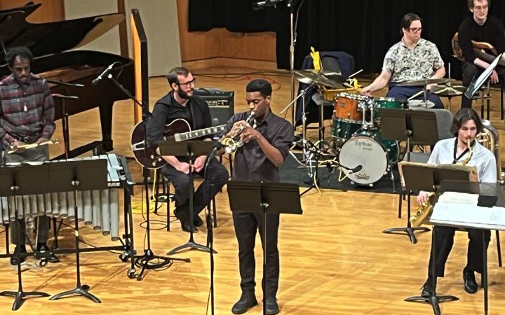 Tamir Saleem-Peoples performing a trumpet solo