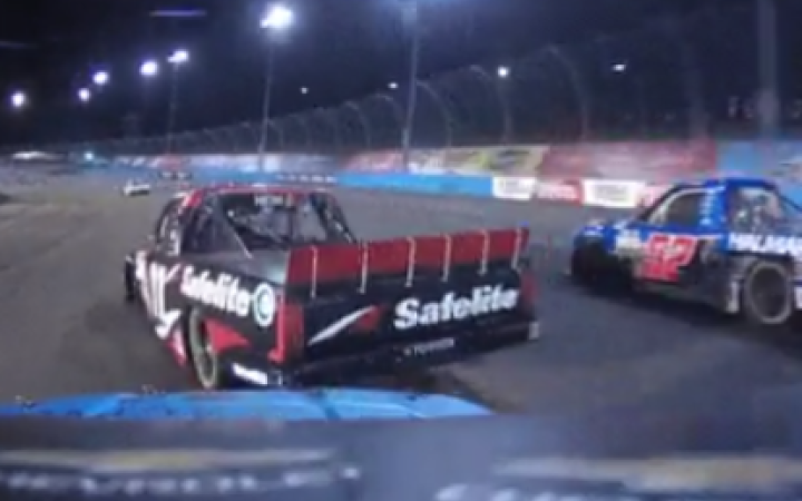 Hocevar makes contact with Heim (11) in the 2023 NASCAR Truck Series championship race at Phoenix Raceway on Nov. 3, 2023.