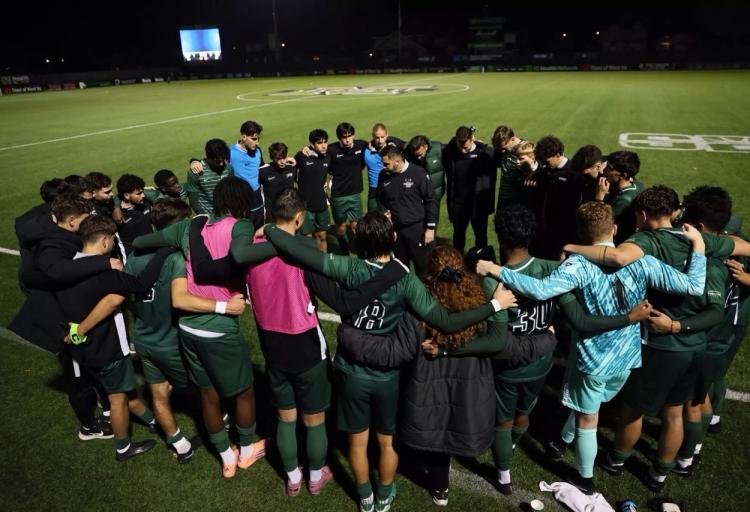 The Vikings huddle after their postseason run came to an end, Nov. 20, 2025 at Hoops Family Field in Huntington, West Virginia.