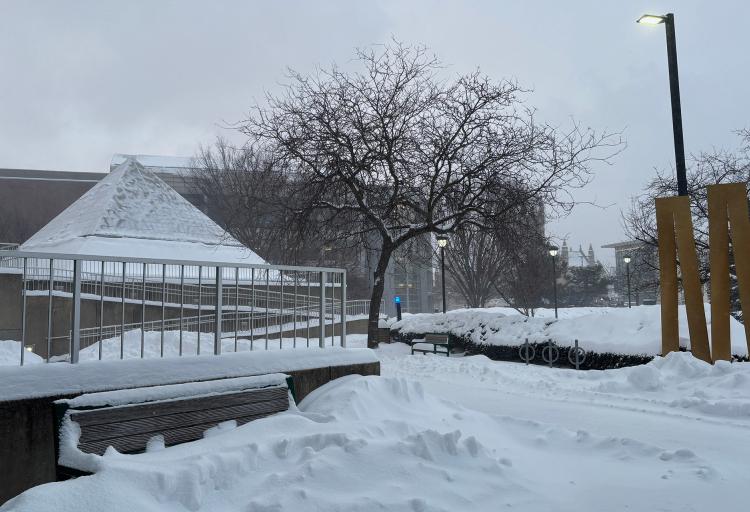 Snow piled up outside of the Music and Communications building on Tuesday, Jan. 27, 2026.