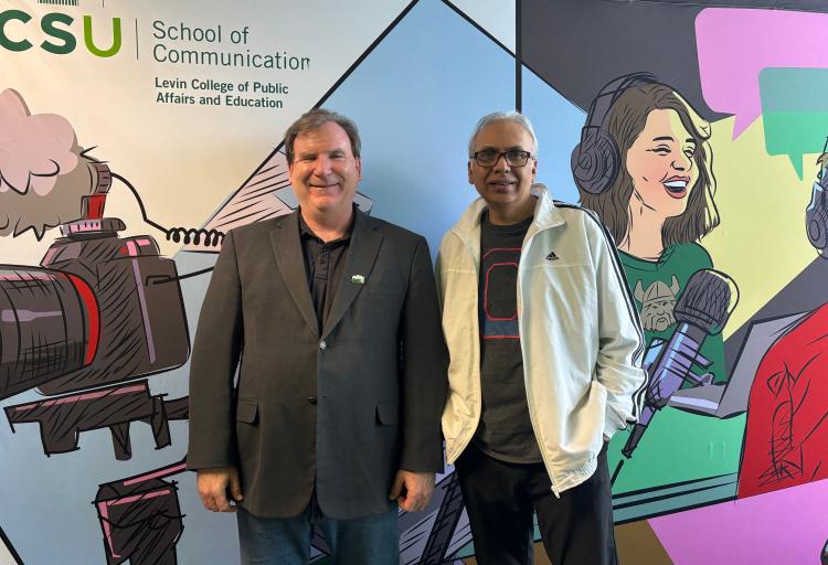 Robert Whitbred, Ph.D. (left) and Anup Kumar, Ph.D. (right) at the Cleveland State University School of Communication, April 16, 2026.