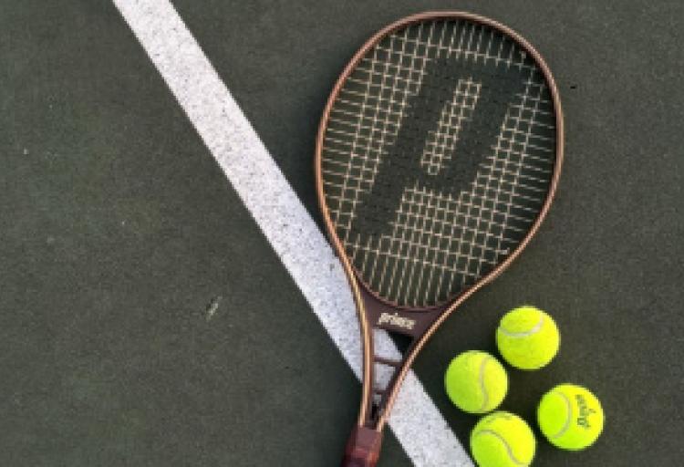 tennis balls and racquet