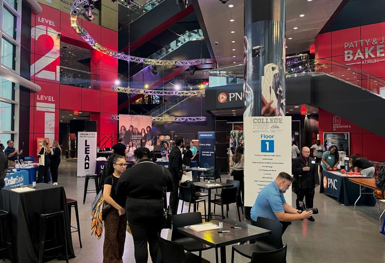 Students speak to employers located on the first floor of the College Fest 2026 at the Cleveland Rock and Roll Hall of Fame.